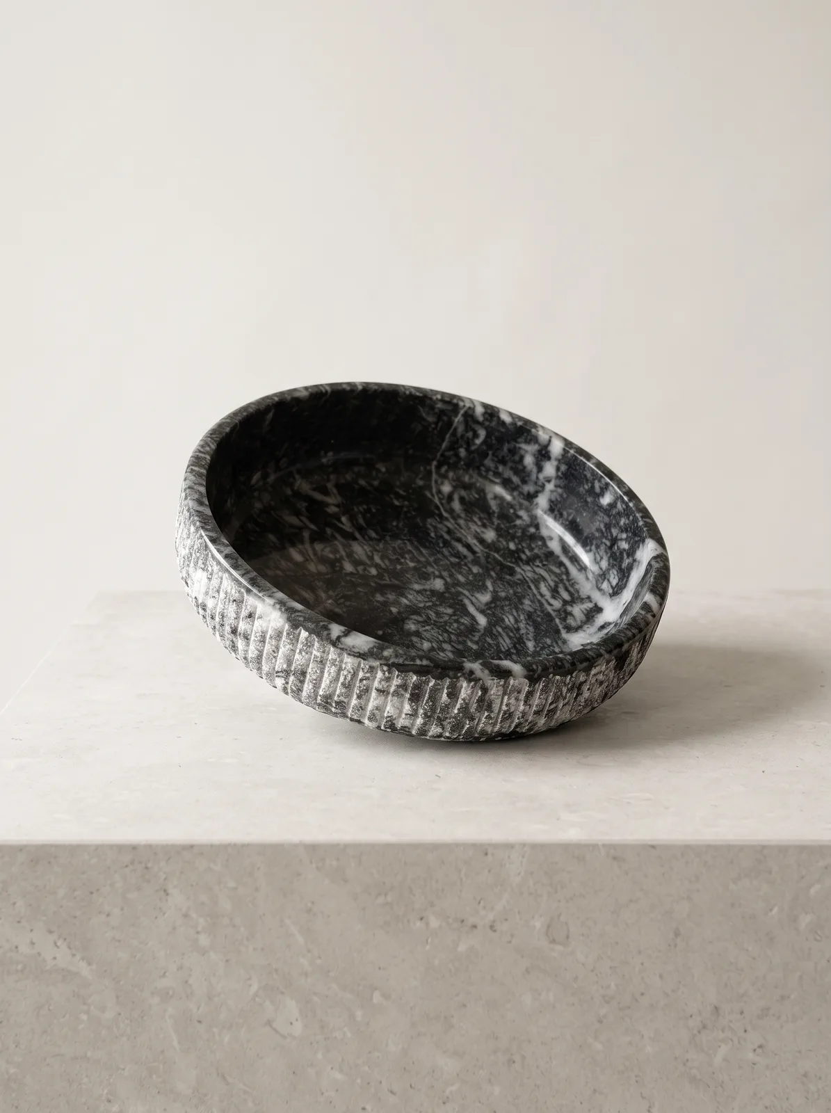 Serving bowl carved from black marble