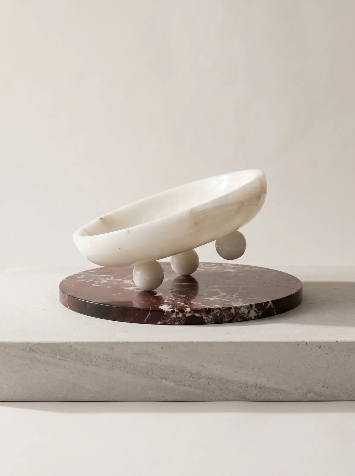 Footed bowl in honed white marble